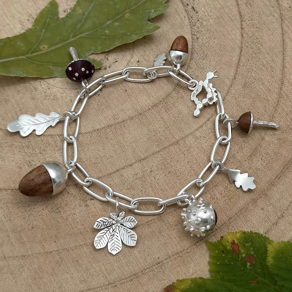 Autumn acorn and conker wood and silver charm braclet